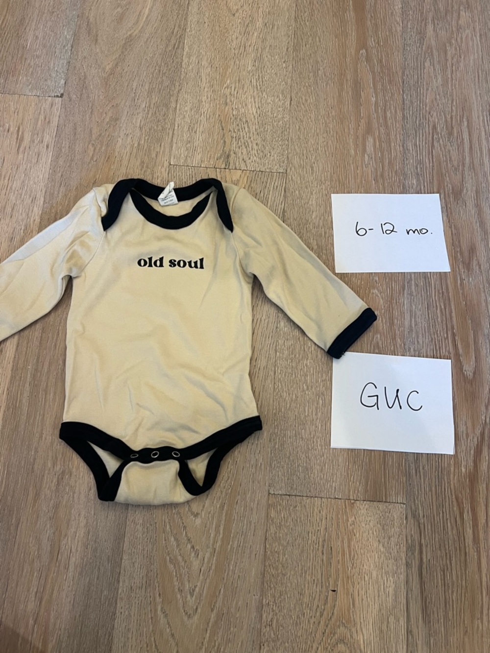 kate quinn Beige One-Piece Bodysuit with Black Trim - "old soul"
